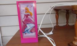 Princess nightlight. It has different princess pictures. Never been use. Any girl will love it