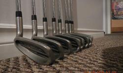 Set of ProStaff Irons, with oversize stainless steel heads. Steel shafts. These clubs are in great shape and have served me well for the past few years.