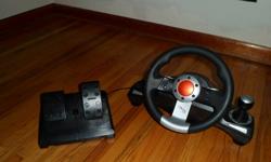 Steering wheel and foot pedals, works great just never use it
wireless with receiver
obo
