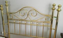 Very good firm bed frame, golden, with nice details.All parts with it