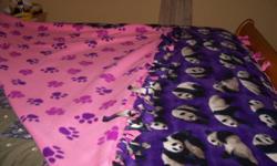 I have a queens size, reversable, no sew fleece quilt for sale for $150.00.  Approximate size is 65" X 85" and it is made with new material in a smoke free home.  I don't like the ties on the top part of the quilt so I sewed it straight across and tied