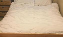 It is in fairly good condition & fits a queen mattress. It is a lower bed to the ground & pick up is in North Regina.