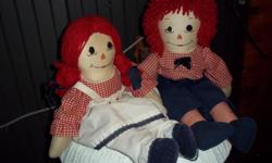 Raggedy Anne and Andy 24" dolls with wood hand made pram, The dolls are in very good condition needing a little cleaning, the wooden buggy is sturdy and in good condition.