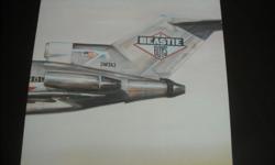 LICENSED TO ILL...BEASTIE BOYS FIRST ALBUM...RECORD & JACKET ARE IN MINT CONDITION...Doesn't Look Like it's Ever been Played...Hard to Find Canadian Release-FC 40238 With Bar Code 61213 40238 01...Sells For up to $100 on Web, in This Condition...Enhance