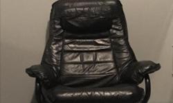 Gently used, no longer have room for it after a move. Genuine leather, well cared chair for reclining black leather chair that can turn 360 degrees. Padded neck rest that can flip up or down. Paid 180$ asking only 65$. Pick up.