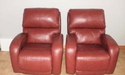 These leather chairs are less than a year old and only used less than 6 months. Both chairs are power reclining (they do not rock). Power can run off battery or wall plugin. Purchased from Leon's for $1300.00 / chair + tax. There is a slight rub mark on