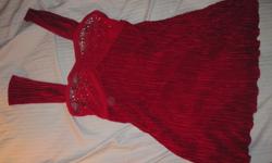 Really cute red top. I bought this in Toronto, just don't wear it. Worn once, size medium, asking $10 obo.