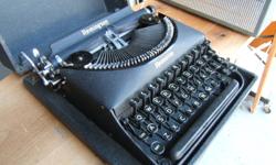 Old remington portable type-writer in case for 35.00   337-2127...