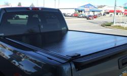 Roll-up tonneau cover by Retrax, fits 07-12 Chev/GMC, 5'8" box, like new, only 1 year old,  Paid $1800, sell for $800