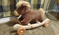 Very cute riding horse with wheels. Also, converts back to rocking horse. Plays music too.
Very clean and in good shape. Used for grandchildren.