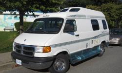 This is a great like new Motor Home Van and is fun to drive. We get 15+ MPG on the highway. Drives like a car This vehicle will park anywhere that a conventional conversion van could park. There is no problem negotiating downtown areas and busy streets