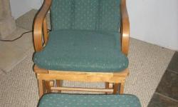 dark green rocking chair with ottoman, in excellent condition