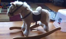 Our son has outgrown his toy. Soft, plush, sturdy rocking horse for a toddler. It neighs and clip/clops.
$20