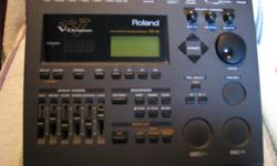 For sale a Roland TD-10 V- Drum electronic drum module for live or in the studio. Loaded with features including 50 drum kits, 600 drum sounds, sequencer, 12 inputs for snare, kick, toms, cymbals etc. Midi, headphone input. Customize your own kit Comes