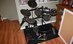 Roland Electric Drum Kit with TD-3 controller $450.00 obo
Has 2 cymbals, 2 toms, 1 snare and 1 hi-hat.
Also comes with stool, drum sticks and headphones. Has an audio input to plug in an Ipod or other device.
This is a really fun little drum kit, it