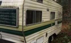 Older RV double axle with brakes and good tires 17 foot RV 21 at the tongue