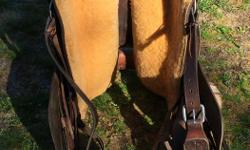 A hand crafted saddle complete with tack box and all the goodies one can imagine inside. Well maintained and cleaned/oiled yearly. This sales includes brushes, saddle bags, spurs, etc., etc. asking $2950/OBO.