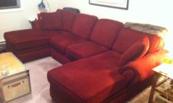 Three piece Sectional couch. Brand new 04 years ago. Red cord upholstery. Two chaise lounges and on bench. Great for a media room or a relaxing living room set up.