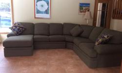 Sklar Peppler sectional sofa with chaise lounge in very good condition. Neutral sage green in colour. Great for large family or rec rooms.