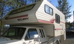 This lightweight (2,303 lbs) basement model has been lovingly looked after and has structural upgrades done recently. Exceptional interior storage, lots of counter space. The large sky light and bright cabinets give this camper a spacious and open