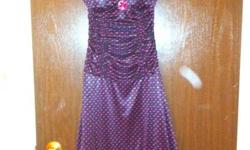 I have a pink and black semi formal knee length halter style dress. Worn it twice fits a true size 8 is gorgeous and cinching around waist is great. Paid $120 originally.
