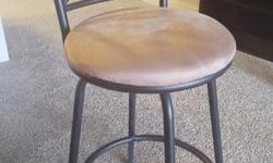 Set of 3 bar stools for sale. Microfiber seats and metal frames. Very sturdy and hardly used, no tears or scuffs. Reason for selling is that we're moving.