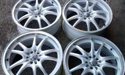 Set of 4 nice shape ADR 18" Rims, dual bolt pattern 5x100mm and 5x114.3 mm, 18x 7.5 width , please see pictures.
