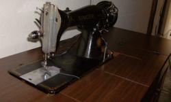Singer, antique machine with updated table, no fancy stitches 47" long x 17" wide x 31" high