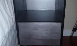 Black & silver with 1 drawer. Located in CR
