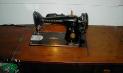 one singer sewing machine with hand held
Also has singer oil can.
 $200 or best offer.5198239705