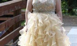 Hello, I'm selling this beautiful dress that I wore for my prom, I'm not one for dresses at all but this dress totally made me feel like a princess and it's super comfy, it's roughly a size 18 but has a corset back, I'm 5'3 and it was pretty long on me,