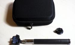 New small camera carry case and a selfie stick with additional adapter for GoPro. Very nice case for any small-size camera and its accessories, with blocks of foam still in it so can configure it as you like. The selfie stick gets quite long. This works