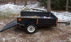 Removable sides and front gate folds down to extend length, hitch size 2", remove bolt off frame for tilt operation,  906, lbs 1998, VERY good condition to haul four wheel bikes, snow-machines, lawn equipment, snow blowers with easy on and off ramp. Light