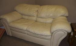 Leather Sofa and Love Seat - beige in colour. Decent shape. Still lots of life left in them. Perfect for a play room or the cottage. $300 for both.