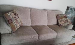 Beige sofa bought from the brick. Moving must sell