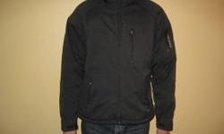 Engineered for skiing. This men's medium fits quite large - I'm 6'2" and you can see it fits great. It is charcoal black, has detachable hood, underarm vents, breast pocket, warm side pockets, water resistant. This is an excellent price for a high-quality