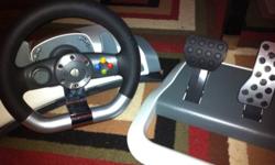 SOLD Thanks Kijiji!!! Xbox 360 steering wheel. Excellent condition, like new. Everything included: wheel, pedals, table clamp and plug. Great fun! Make a great Xmas gift. $50. Will even throw in Project Gotham Racing 3 game for free! Don't let this deal