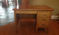 1950's Solid Oak desk, 4 locking drawers, matching solid oak custom chair, swivels and tilts on coasters.