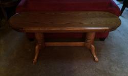 Solid oak table, with claw feet, 54 inches long and 17 inches wide