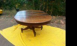 Solid oak round table with 3 leafs
no chairs
from between the 1940's and 1960's
needs a little fixing up
located in Duncan
$300 OBO