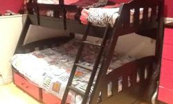 Single over double solid wood bunk bed.