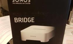 New in box, I got an extra one of these thrown in when I bought my Sonos components. Plug into your router and it expands the wifi range of your Sonos system. I already have one hooked up so this is a spare. $59 New at Bestbuy.