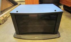 Black Sony TV stand with smoked glass door. 2-shelves inside. Good condition. $10 OBO