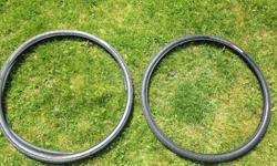 Pair of Specialized Infinity commuter road tires with tubes. Used twice then replaced.
