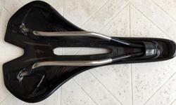 Specialized Toupe Expert 155mm (widest option available for comfort) Ti Rails, Carbon-reinforced shell with lightest level of padding (read: minimal and 220g according to Spesh), came on a SWORKS Tarmac that was sold and have no use for it. Excellent,