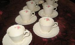 Spode's 'Billingsley Rose' pattern, featuring delicate pink sweetheart roses on a creamy lace background - absolutely darling little set of eight ?half-cup? sized pieces
Manufactured in 1926 - England - pink back stamp
Demitasse size - cup diameter is 2