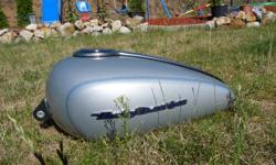 I'm selling an 04-06 1200xl gas tank (it should be able to fit a wide variety of models).  It is in excellent condition as you can see by the pics.  It doesn't leak or anything like that I am selling it I switched to the peanut tank to change the look of
