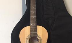 3/4 size guitar for smaller persons. Quality entry level guitar for beginners in excellent condition ($169 new) plus after market padded guitar case ($60+ new)
