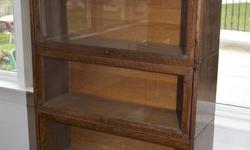 5 section stacking bookcase. Quarter sawn (tiger) oak.
74.5" high, 34" wide 12"deep
