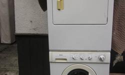 Kenmore washer and dryer (stacking). Stainless steel inside washer and dryer.